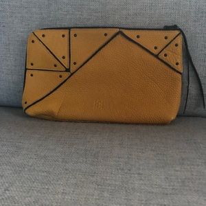 Vegan leather, mustard yellow with black trims clutch.